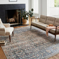 In the room | llynfi oriental area rug in a living room with a fireplace