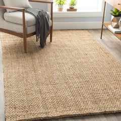 Angle | Three-quarter view of the Bremhaus Quantock Flatweave Jute Area Rug
