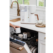 In use | Specialty Drip Coffee Maker on counter with coffee beans