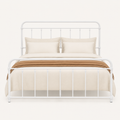 Front | White metal spindle bed shown straight on against a pale background