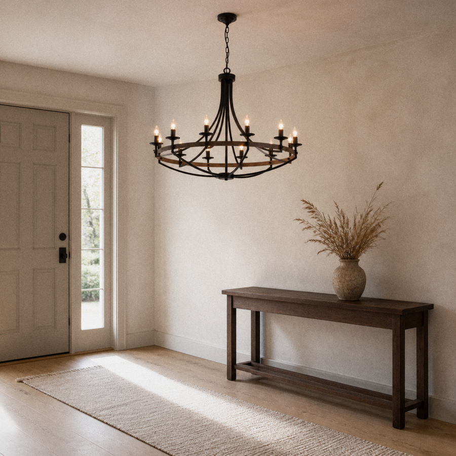 Entryway | the chandelier hung above a console table near the front door