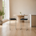 Scale | both stools against a full window in the flax dining room, true size