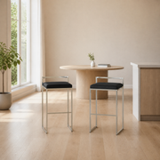 Scale | both stools against a full window in the flax dining room, true size