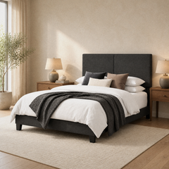 Room 1 angle | Three-quarter room view showing the upholstered headboard, footboard, and tapered legs