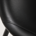 Closer | midnight-black vegan-leather grain and the single top-stitch seam