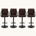 Front | all four matching stools centered on paper, square-tufted leather and the swivel pedestal base visible