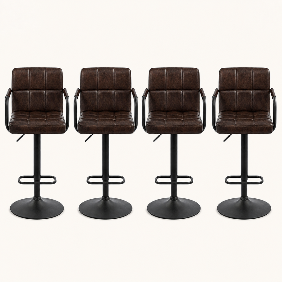 Front | all four matching stools centered on paper, square-tufted leather and the swivel pedestal base visible