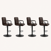 Studio | all four stools at a true three-quarter studio angle, tufted back depth and the pedestal base both reading