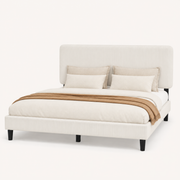 Fabric detail | Close view of the bed's textured beige chenille upholstery and channelled headboard