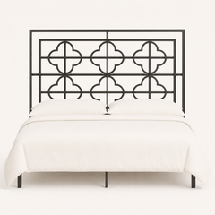 Front | Straight-on studio view of the full rectangular headboard with its open quatrefoil pattern