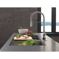 Trinsic Touch2O Kitchen Faucet with Touchless Technology in Arctic Stainless | product photo