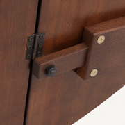 Hardware | close-up on one underside hinge and its wood support bracket that holds a leaf level