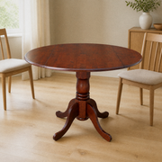 Third room | same espresso drop-leaf table in a warm flax dining room, bright midday window light
