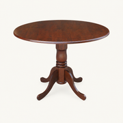Front | espresso drop-leaf table centered on paper, both leaves raised, turned pedestal on four curved feet
