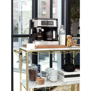 Lifestyle | combo brewer on a bar cart by a city window with espresso and latte