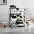 Lifestyle | Arte Evo espresso machine on a kitchen counter with iced and espresso drinks
