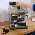 Detail | Arte Evo grinder hopper and dosing funnel being adjusted by hand