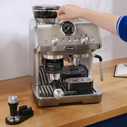 Detail | Arte Evo grinder hopper and dosing funnel being adjusted by hand