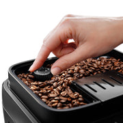 Detail | Magnifica Evo espresso machine grinder adjustment dial on the bean hopper