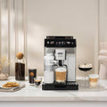 Lifestyle | Eletta Explore machine on a marble counter with cold and hot coffee drinks