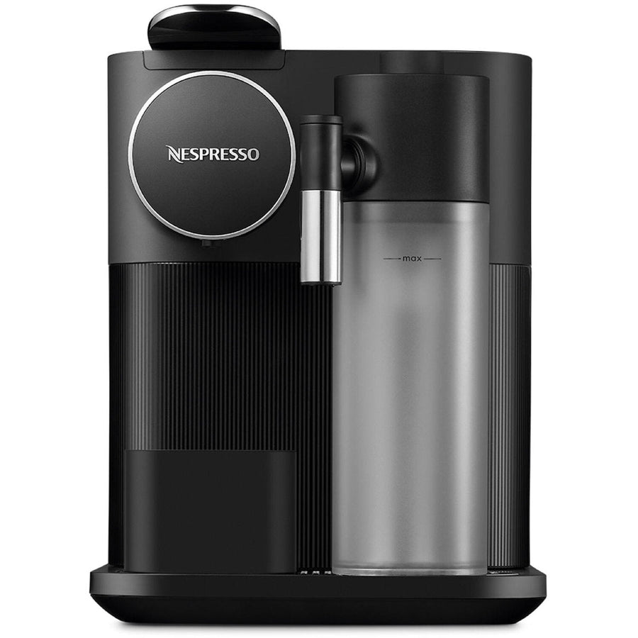 Angle | black machine with the capsule lever open showing the milk-frothing jug