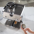 In use | espresso prepared with the stainless Opera machine on a kitchen counter