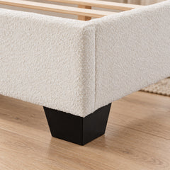 White boucle bed frame corner and black foot