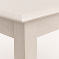 Joinery detail | close-up on the tabletop's beveled edge and apron-to-leg joinery