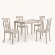 Front | antique-white table and four slat-back chairs centered on paper