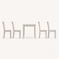 Side profile | true side view of the table's depth and one chair's silhouette