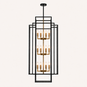 Front | studio front elevation of the black nested iron cage, gold pole, and three tiers of candle lights