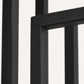 Texture | close view of the matte black iron bars and brass center pole