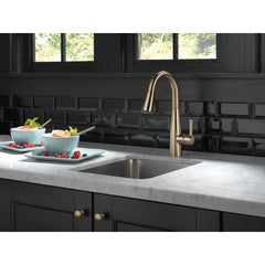 Essa Bar Sink Faucet with Pull Down Sprayer in Champagne Bronze | product photo