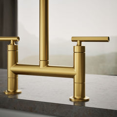 Kohler Purist Two-Hole Deck-Mount Bridge Kitchen Sink Faucet in Vibrant Brushed Moderne Brass | product photo