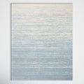 Full rug | the whole rug flat on a plain backdrop, no furniture