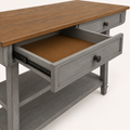 Detail | one drawer pulled open showing the slide and dark-bronze knob