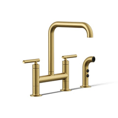 Kohler Purist Two Handle Deck-Mounted Bridge Kitchen Sink Faucet with Side Spray in Vibrant Brushed Moderne Brass | product photo