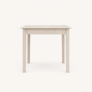 Side profile | true side view of the table's depth and one tapered leg's silhouette