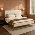 Clay corner | Angled clay-room view showing the upholstered headboard, footboard, and open frame base