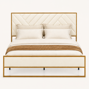 Detail | Close front view of the diagonal channel tufting and soft cream upholstery on the headboard and footboard