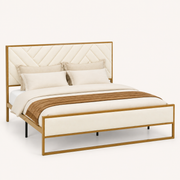 Studio | Three-quarter studio view of the cream upholstered headboard and gold-finish iron frame