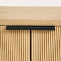Hardware | close-up on the matte black bar pull at the door seam