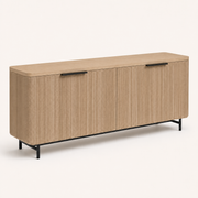 Studio | three-quarter studio view of the tapered black legs, rounded corner and the ribbed door fronts
