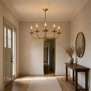 In a room | natural brass 5-light candelabra chandelier hanging in an entryway