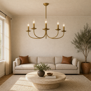 In a room | natural brass 5-light candelabra chandelier hanging in a living room