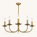 Front | studio front of the five curved brass arms and candle-style bulbs