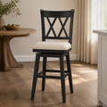 In a room | the stool at a warm plaster dining room's island edge, low golden late-afternoon light from the right