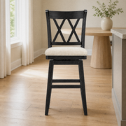 In a room | the stool at a bright flax dining room's island edge, midday light from the left