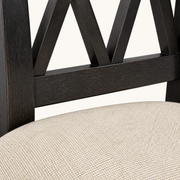 Closer | beige woven polyester seat fabric and the double-X back rail join