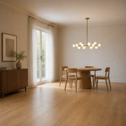 Scale | marnau Glazenn 16-light sputnik chandelier shown at scale in a dining room, hung well below the top of a floor-to-ceiling window and door for size reference